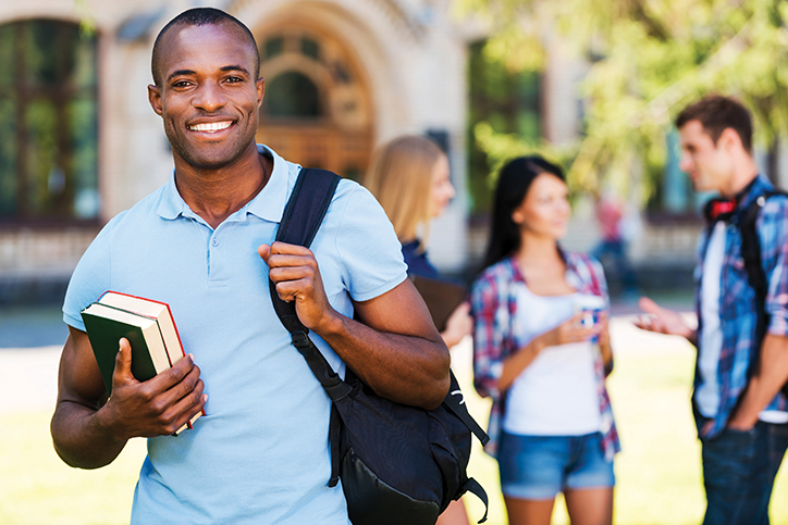 college student with bag and textbooks