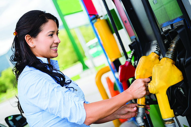 woman pumping gas