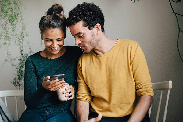 couple looking at phone