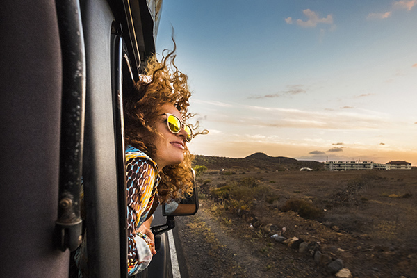 woman outside of car