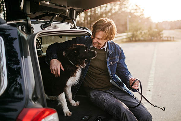 Man playing with his dog