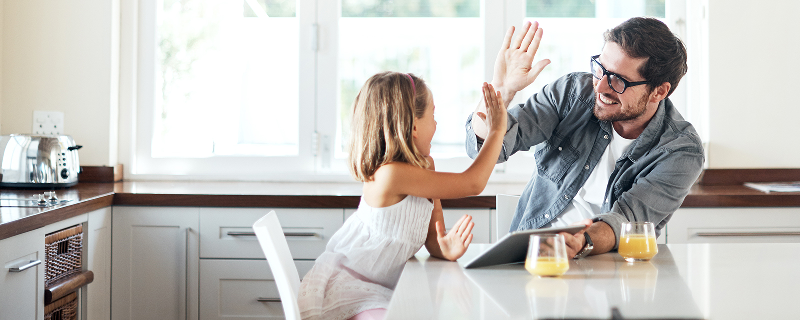 Father and daughter high five