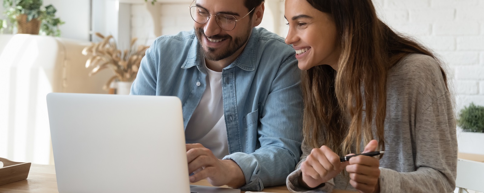 couple looking at laptop