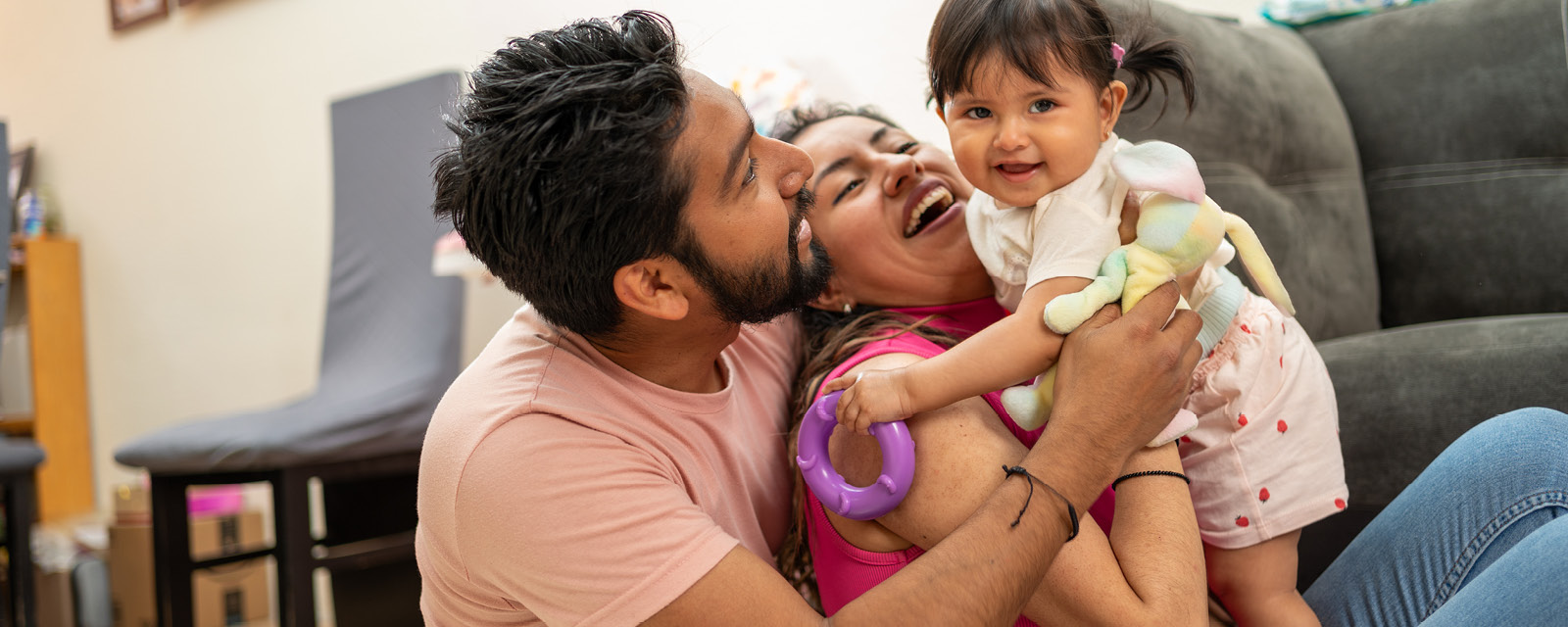 Happy family in their home