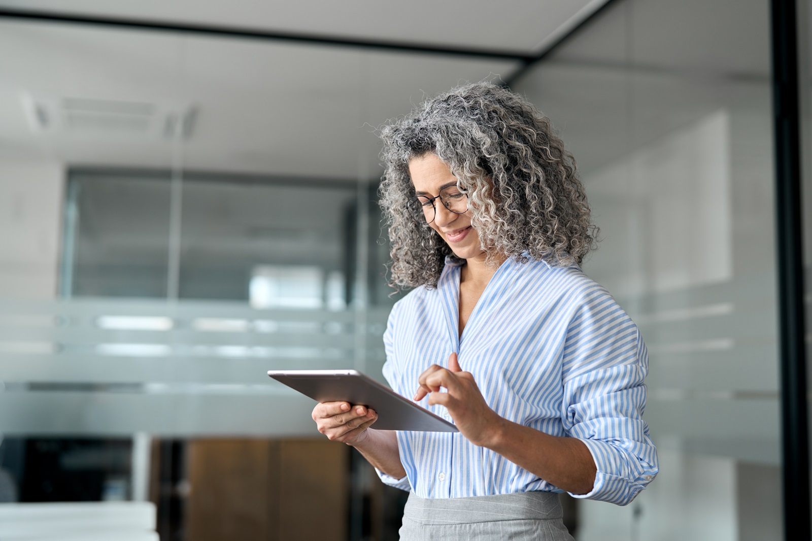 older woman on tablet