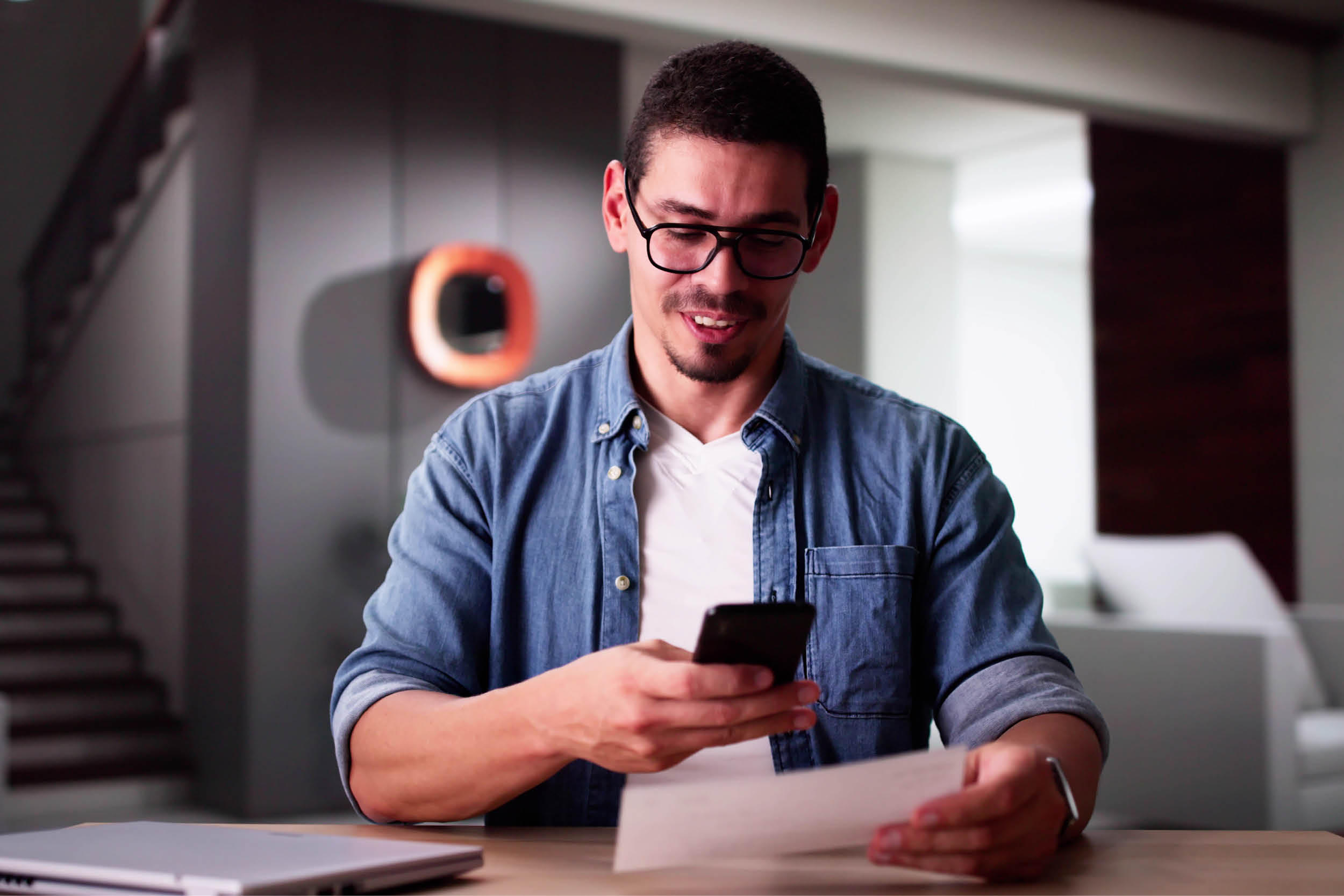 man looking at phone